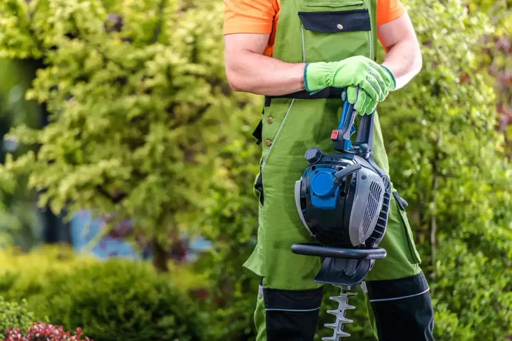 How to cut grass with hedge timmer