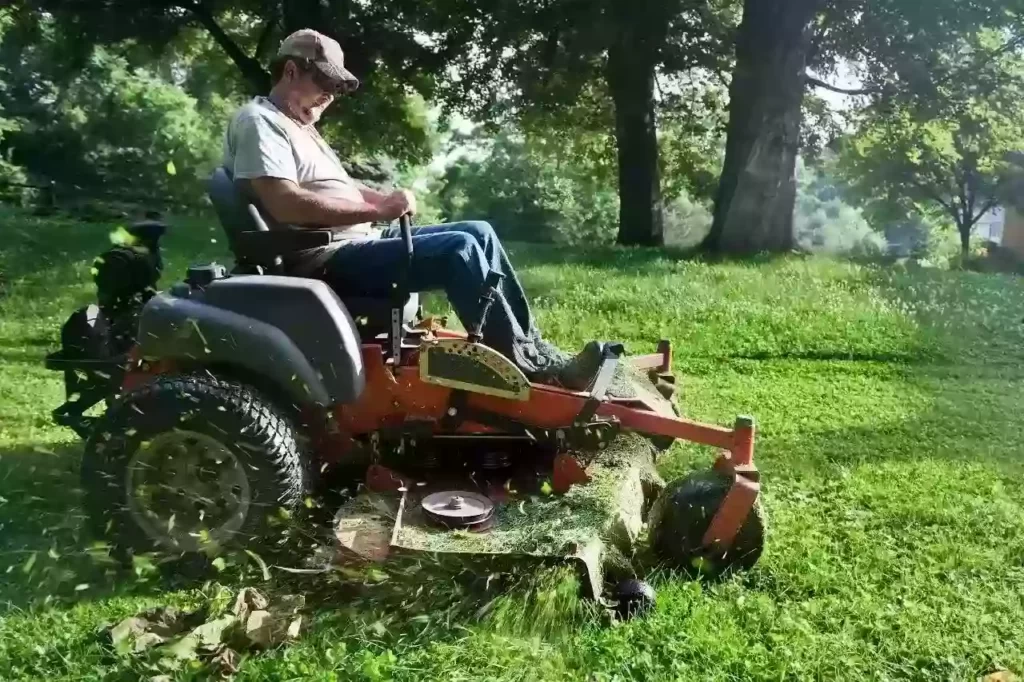 how to install riding lawn mower blades